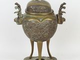 bronze incense burner on stand on white background with white background