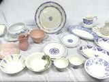 a table with a lot of plates and bowls on it