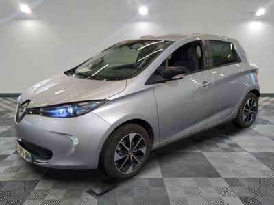 an image of a silver car in a showroom