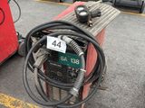 many different types of welding equipment in a parking lot