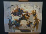 a painting that is being displayed on a easel
