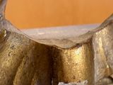 a close up of a metal object with a hole in it