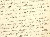 lettre manuscrite écrite à l'encre noire sur une feuille de papier