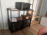 a shelf that has a printer on top of it