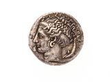 pièce de monnaie en argent portant l'image d'une tête d'homme