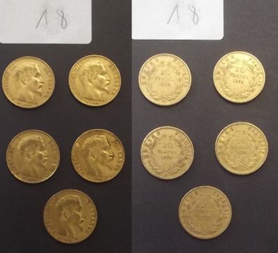 les deux faces d'une pièce d'or sur laquelle figurent l'effigie d'un homme et d'une femme