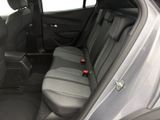 the back seats of a car are empty and the passenger seat is empty