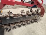 a close up of a chain attached to a machine