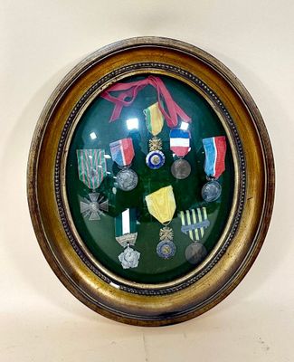 a picture of a picture of a medal display in a round frame
