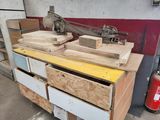 a machine that is sitting on top of a wooden table