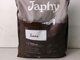 a close up of a bag of dog food sitting on a counter