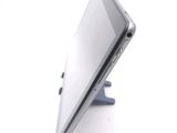 a close up view of a tablet computer on a stand