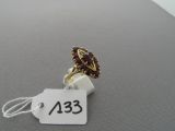 a picture of a ring with a tag attached to it