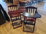 three chairs and a table in the middle of a room