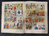 an old comic book opened to show a page of comics