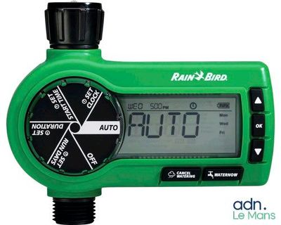 green digital garden timer showing the time and temperature of the garden