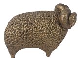 a bronze statue of a ram on a white background