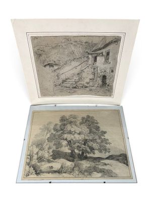 an open book with a drawing of a house and a tree