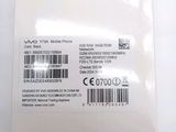 an image of the back of a white box with a barcode on it