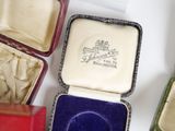 a box with a ring inside of it on a table