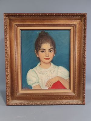 portrait of a young girl in a white dress with a red book