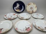 six plates with different designs on them on a table