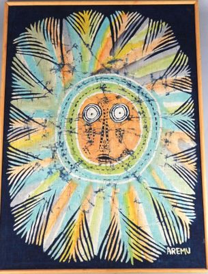 painting of a sun with a face made of leaves on a blue background