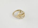 an image of a gold ring with diamonds on a white background
