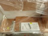 two boxes of electronic equipment wrapped in plastic on top of each other