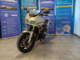 a motorcycle that is parked in a showroom