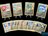 beaucoup de cartes pokemon sur la table