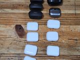 a box of stones and a mouse on a wooden table