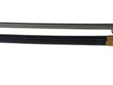 two swords with gold and black handles on a white background