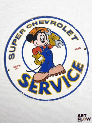 une image représentant un panneau de service sur lequel figure un personnage de bande dessinée