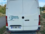 a white van parked on the side of the road