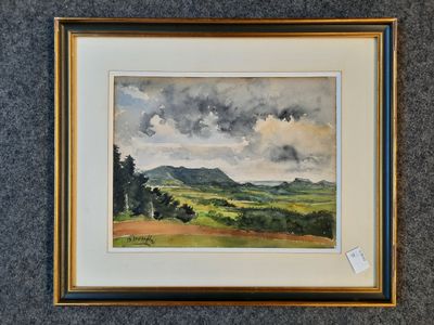 peinture d'un paysage avec des montagnes en arrière-plan