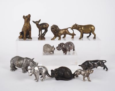 a lot of figurines of animals that are on display
