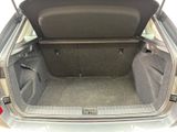 a trunk of a car with the back seats folded down