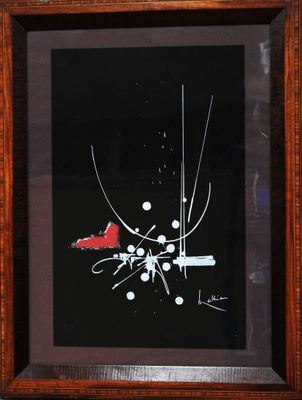 tableau encadré représentant un oiseau rouge perché sur une branche d'arbre