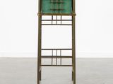 an image of a green cabinet with a drawer on it