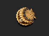 a close up of a gold broochle with pearls on a black background