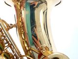 a close up of a person ' s hand playing a musical instrument