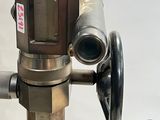 a close up of a metal pipe on a pole