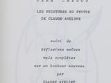 an open book with a drawing of a cat on it ' s cover