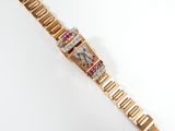 an image of a gold watch with pink and white diamonds on it