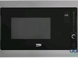 a picture of a microwave oven with the door open