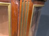 a close up of a clock on display on a table