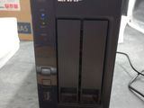 an image of a hard disk drive sitting on top of a table