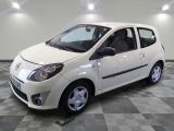 a picture of a small white car on a checkered floor