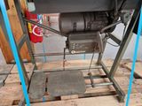 a machine that is sitting on top of a pallet
